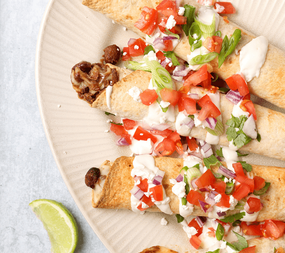 Crispy oven baked taquitos, filled with pinto beans and cheese. This recipe is quick, easy and ready in 30 minutes!