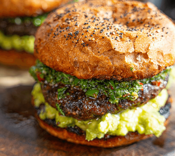 This Argentinian Chimichurri Burger is a fresh recipe idea for your next BBQ. A quick and easy method for kicking your burgers up a notch.